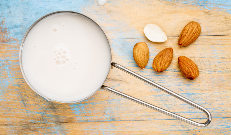 The health and beauty benefits of almond milk, explained