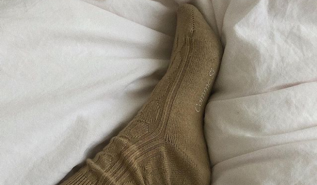 This Is Why You Should Be Wearing Socks To Bed, According To A Doctor