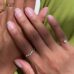 pink-nails-green-background